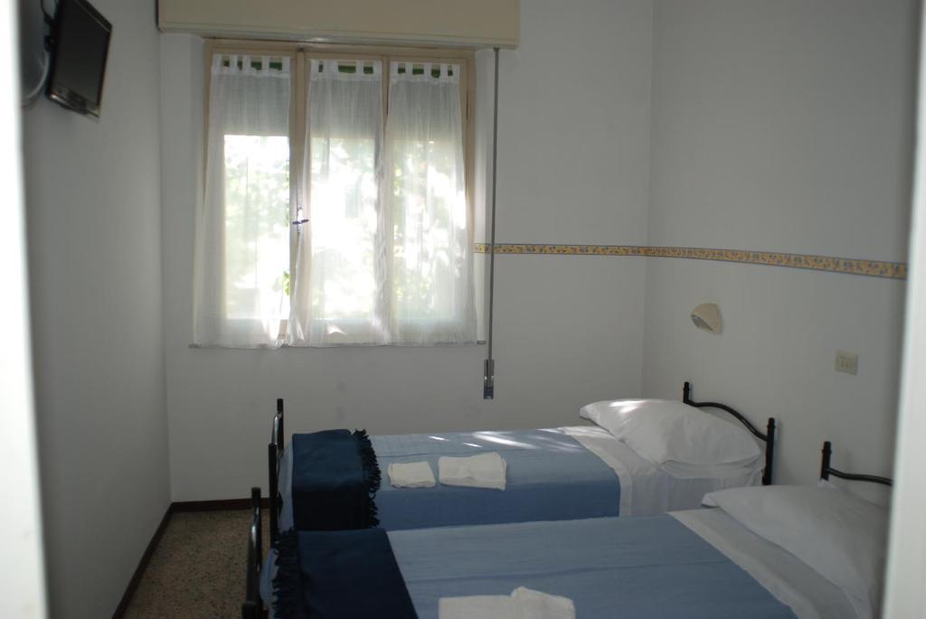 Hotel Zaghini Ріміні Номер фото